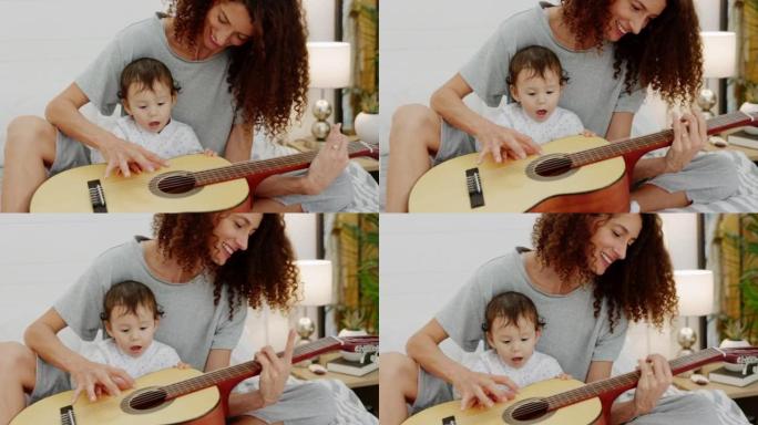 快乐，家庭和婴儿与艺术母亲一起学习吉他，在家中进行演奏，发展和教学。健康，音乐和妈妈在室内卧室里与好