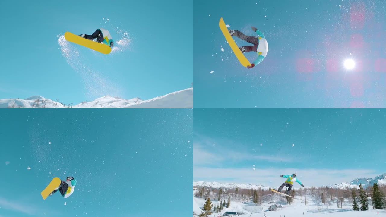 自下而上: 阿尔卑斯山的运动男游客单板滑雪做了一个旋转技巧