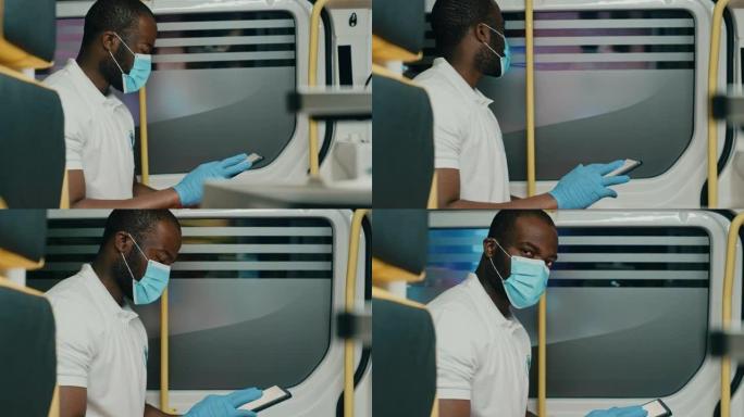 在紧急情况下乘坐救护车时，戴着平板电脑戴口罩的黑人非洲裔美国护理人员。医疗医院外的紧急医疗技术人员。