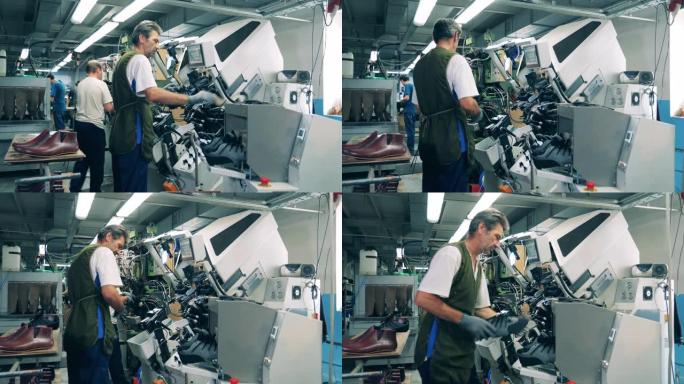 男性工人正在使用机械制造鞋子。鞋类生产设施。