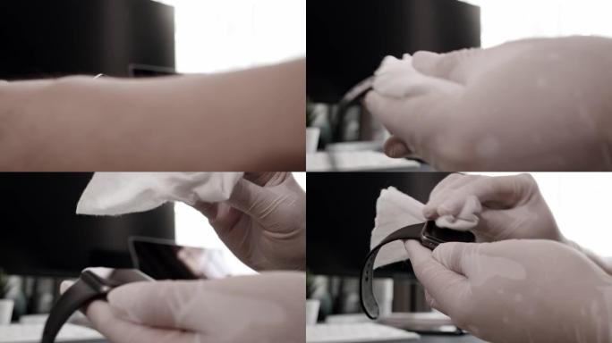 特写亚洲男子使用消毒湿巾清洁智能手表屏幕清洁和抗菌冠状病毒或新型冠状病毒肺炎问题在家里的客厅。4k分