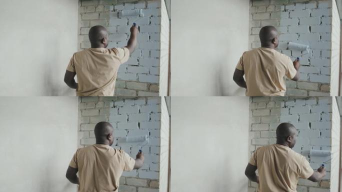 非裔美国人画砖墙的Slowmo