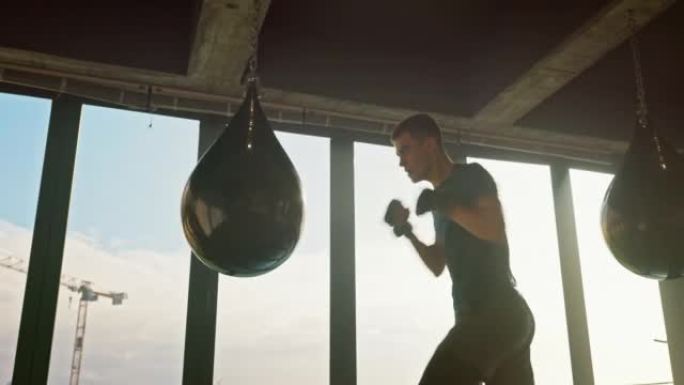 男子，拳击袋和拳击在健身房锻炼，训练和锻炼的愤怒管理，压力控制或强壮的肌肉增长。拳击手，体育运动员和