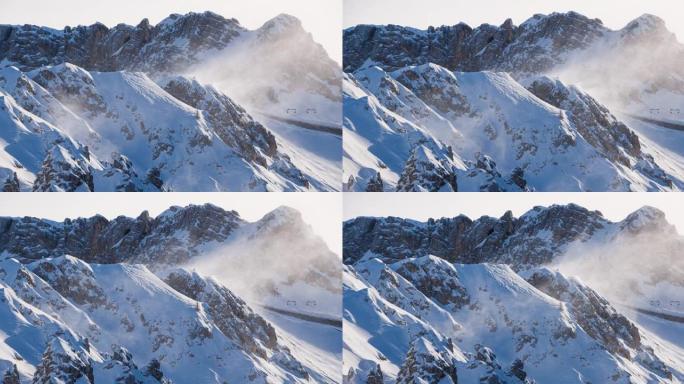 高山景观被雪覆盖雾气山谷群山