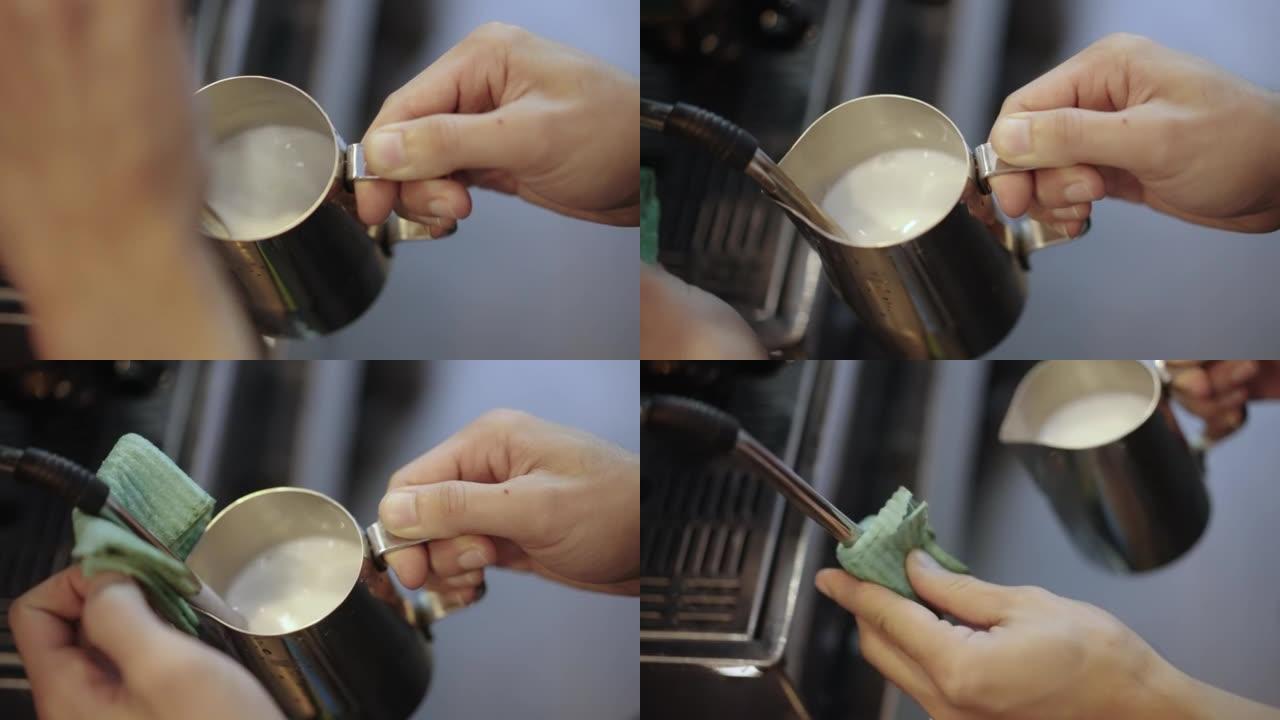 咖啡师手的特写镜头在装有专业咖啡机的水罐中蒸牛奶，用于在咖啡馆中煮咖啡