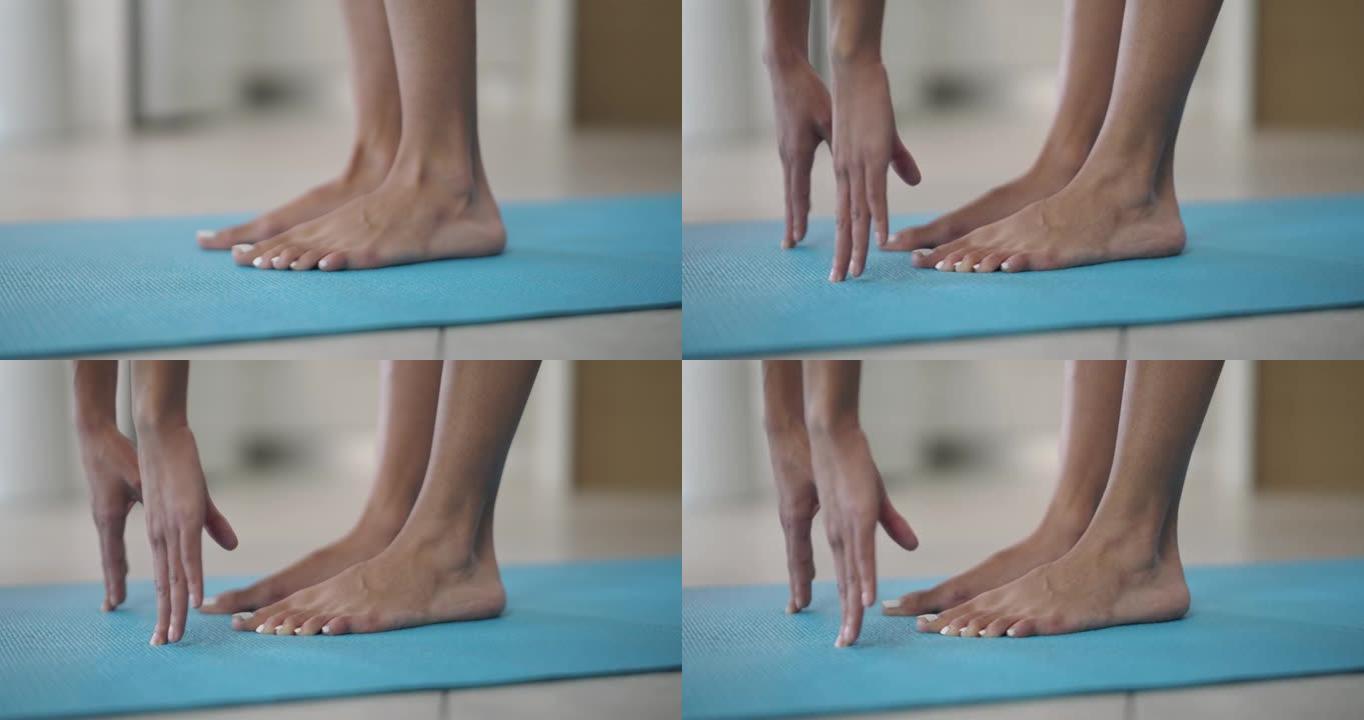 4k视频片段，一名妇女在家中练习瑜伽动作