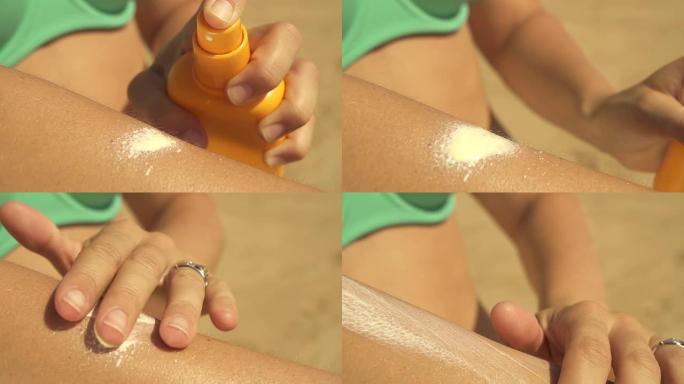 在海滩上应用防晒霜