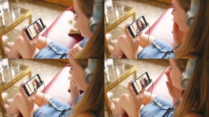 4k视频片段，一名年轻女子使用手机进行视频通话