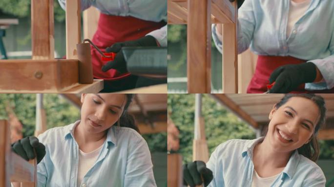 4k视频片段，一名年轻女子在家中从事木制项目