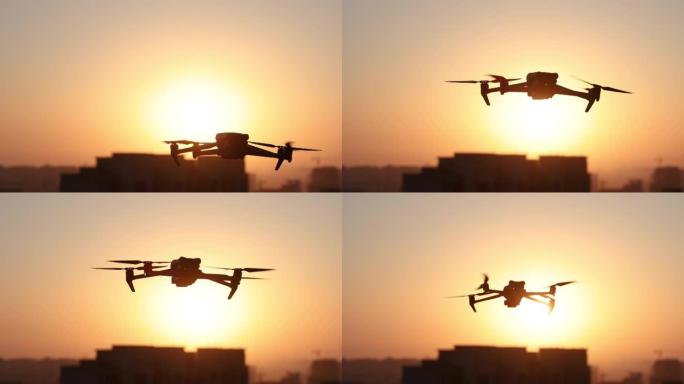 无人机在日落时在天空中飞行