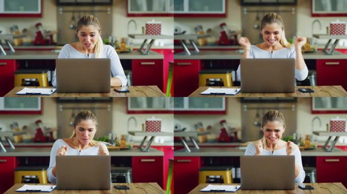 年轻成功的女商人的真实照片正在在家工作时控制笔记本电脑上的电子邮件，并为自己的职业生涯成功封印或晋升