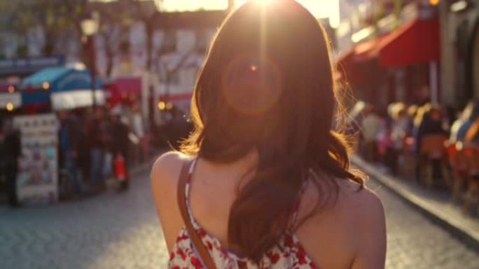 4k视频片段，一名年轻女子在法国巴黎的街道上行走
