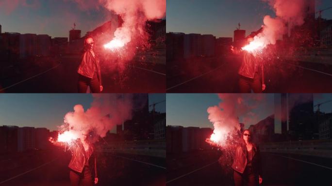年轻女子晚上在城市里挥舞信号弹，叛逆的女孩在街头用烟花抗议女性千禧自由运动