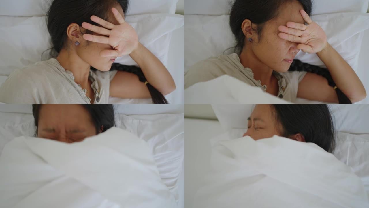 当熟睡的女人日本人遮住阳光时