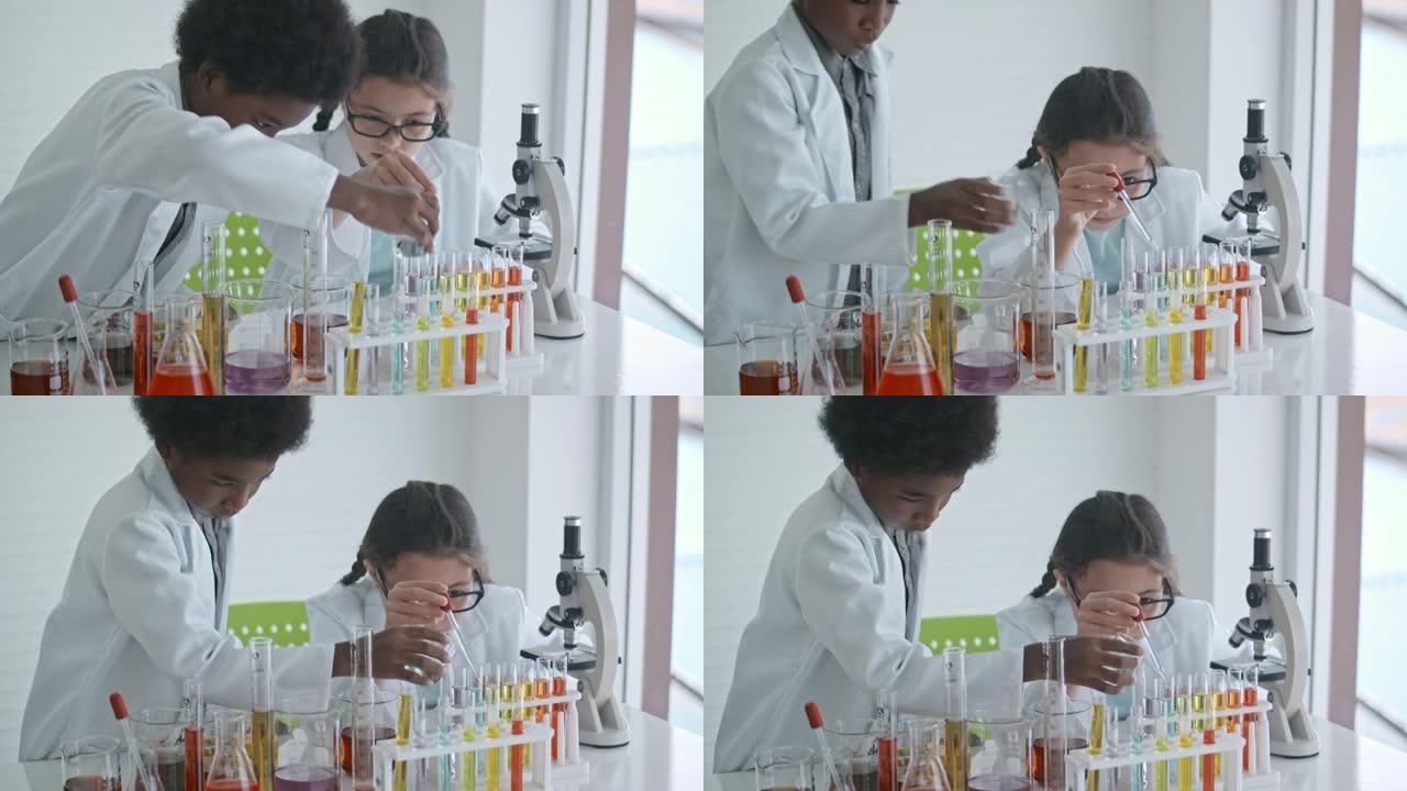 可爱的男孩和女孩进行科学实验