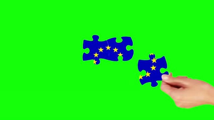 双手解谜。绿色屏风和木材。欧盟旗帜