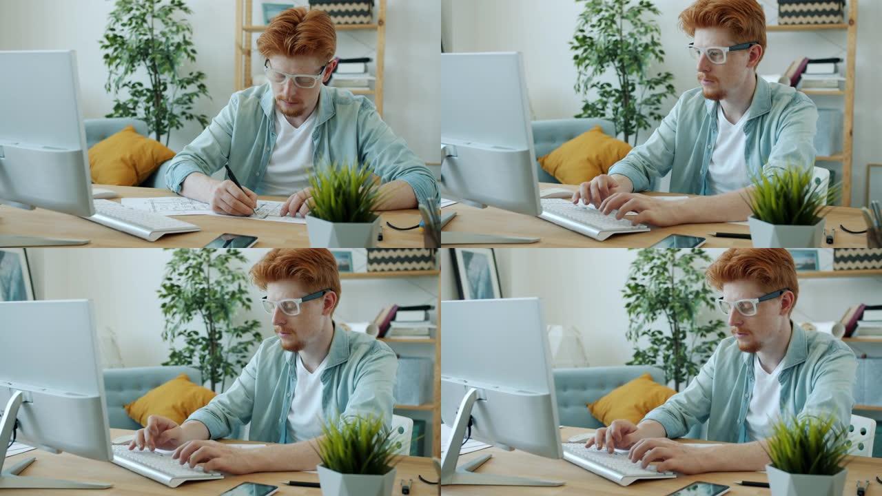 英俊的姜黄色头发的建筑师在家绘图计划和使用计算机