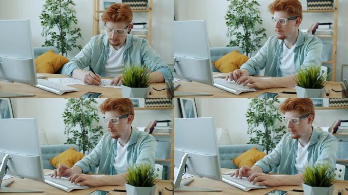 英俊的姜黄色头发的建筑师在家绘图计划和使用计算机