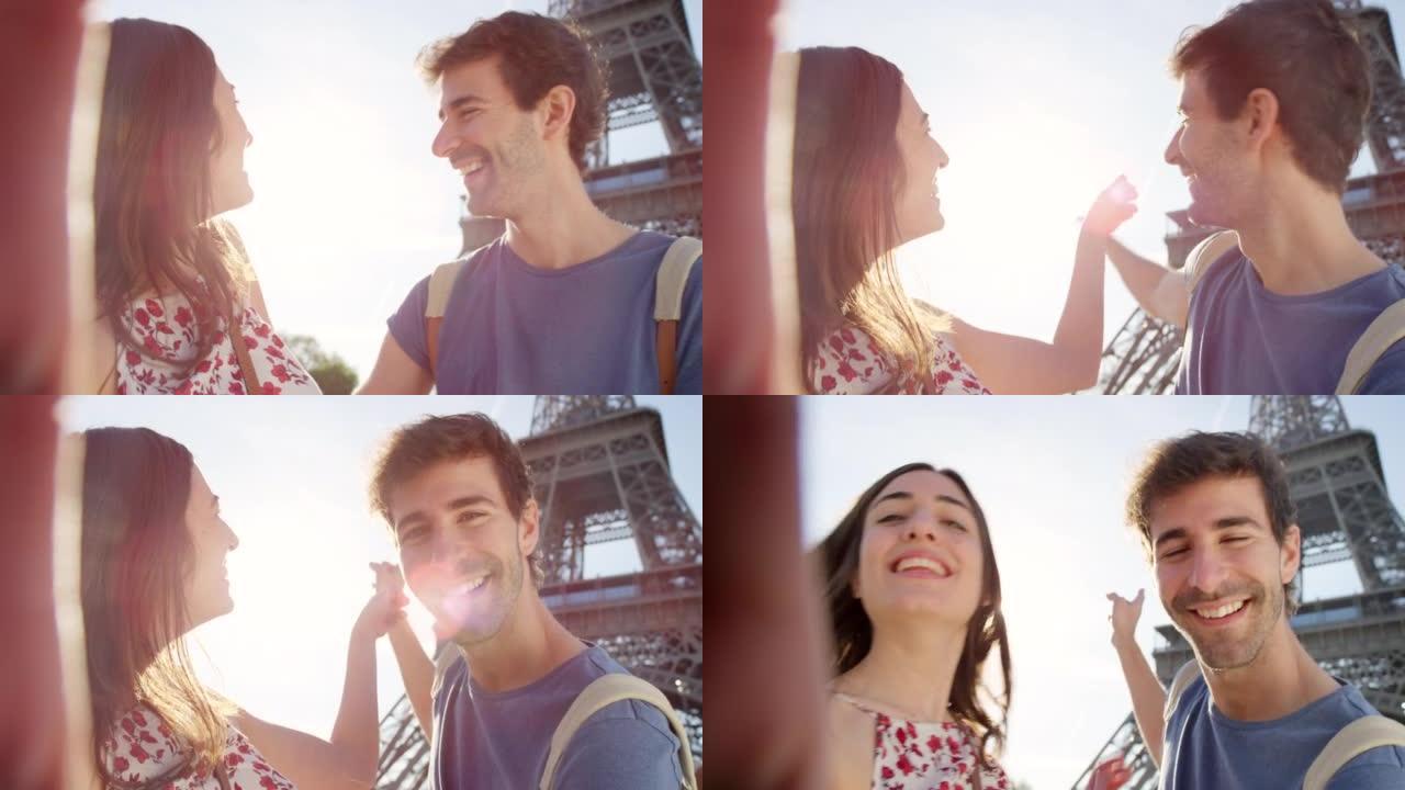 法国巴黎，一对年轻夫妇在埃菲尔铁塔前自拍的4k视频片段