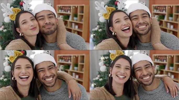 一对年轻夫妇在家一起制作有趣的圣诞问候视频的4k肖像视频