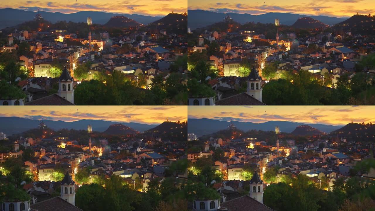 保加利亚普罗夫迪夫老城的夜景。古老的照明房屋和日落的天空。缩小镜头。从普罗夫迪夫市坎特的内贝特·特佩