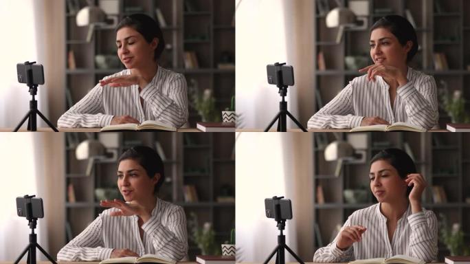 印度女性博客作者制作语音记录新的vlog使用智能手机