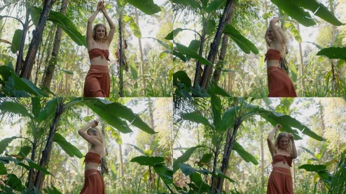 美丽的女人在森林里跳舞在郁郁葱葱的热带丛林4k享受自然舞蹈
