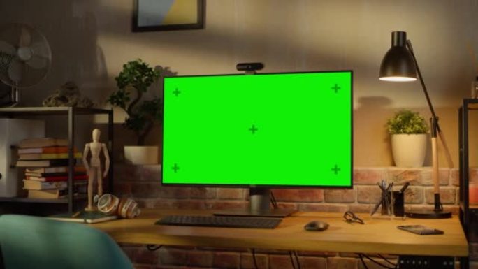 Computer Monitor with Green Screen Standing on a W