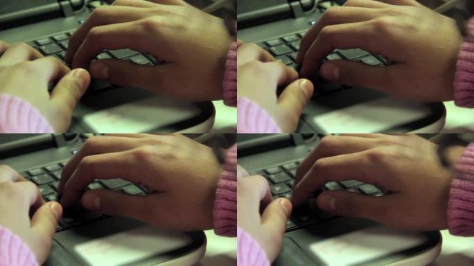 一名视力障碍的女高中生的手在课堂上的电脑课上触摸电脑键盘。特写。