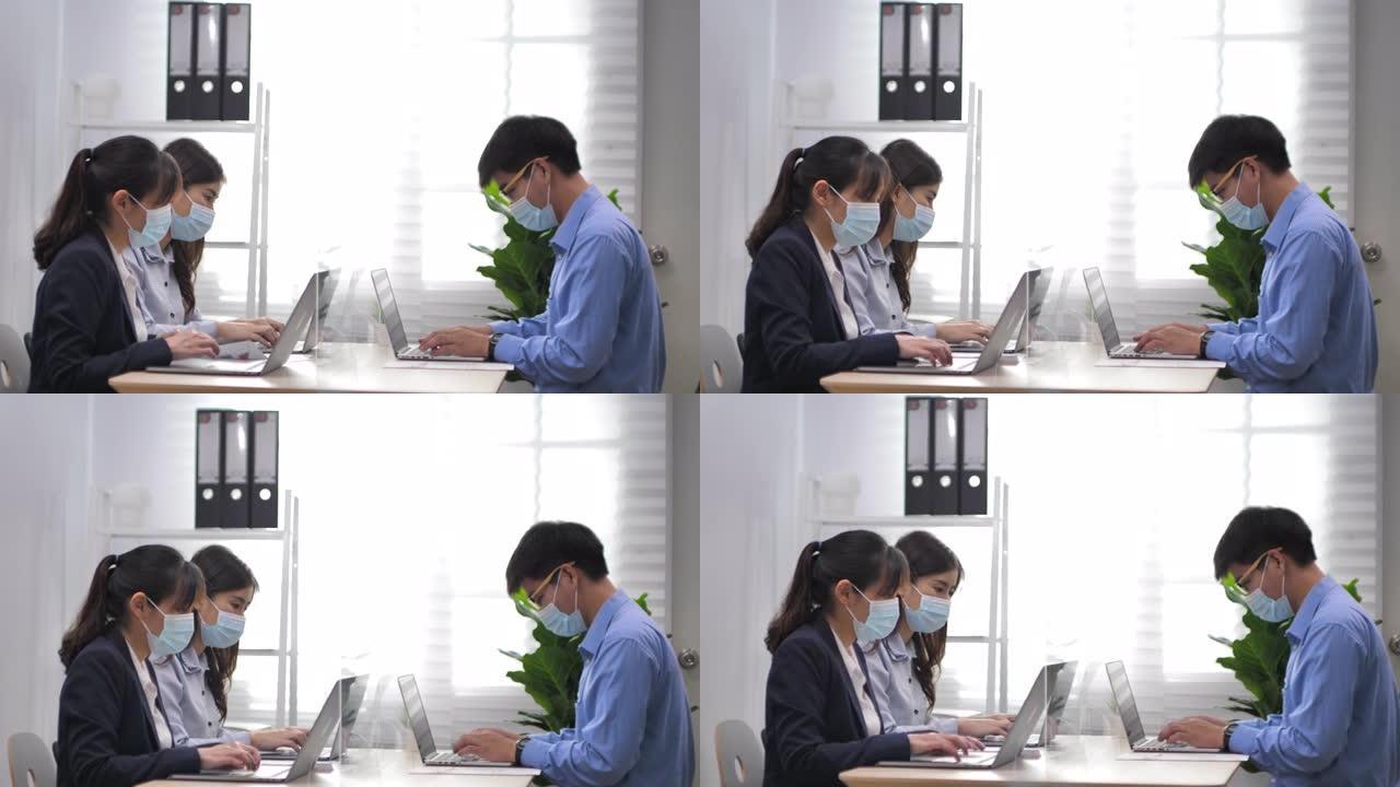 新常态办公会: 一群带面罩工作的办公室人