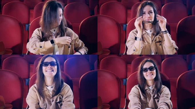 一名妇女在电影中戴上3D眼镜的特写镜头