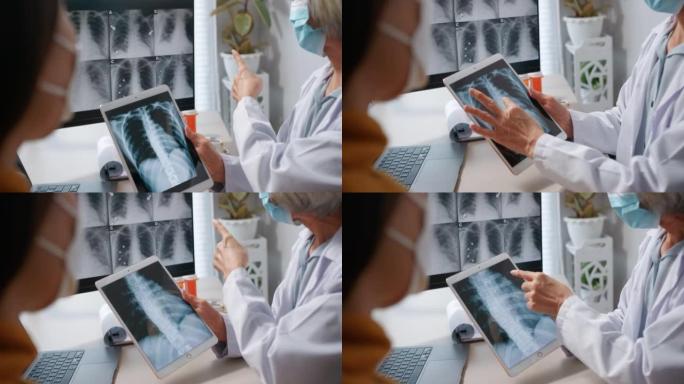 医生在数字平板电脑上显示肺部x光