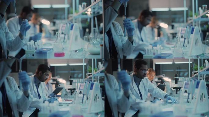 在现代实验室中，一位女性研究科学家使用微量移液管在试管中混合液体。科学家们正在显微镜和平板电脑的帮助