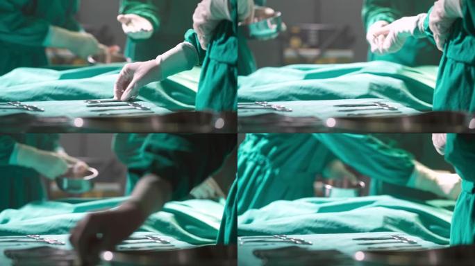 4K UHD多莉离开: 关闭外科医生护士准备手术设备，并把它们交给手术室的外科医生。医院医疗保健概念