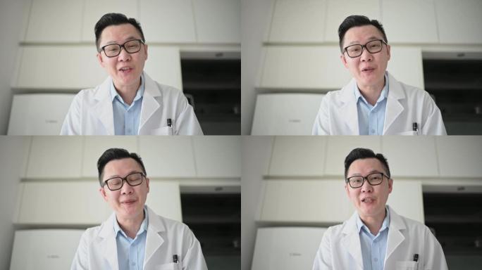 远程医疗远程健康亚洲中国男性医生视频会议与他的病人在家
