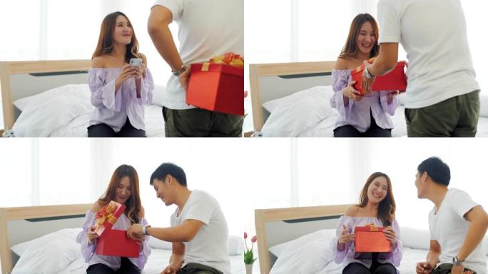 浪漫的情侣给她的女朋友惊喜送礼物