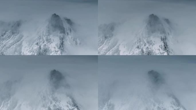 云雾淹没了雪山林海雪山雾凇大雪森林