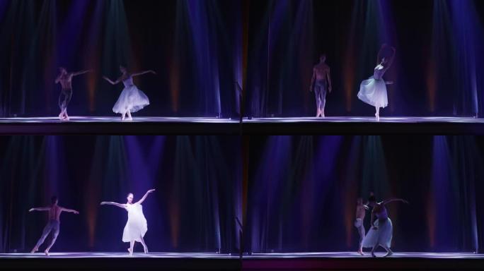 年轻的古典芭蕾舞演员夫妇的电影镜头在演出开始前在经典剧院舞台上表演舞蹈。