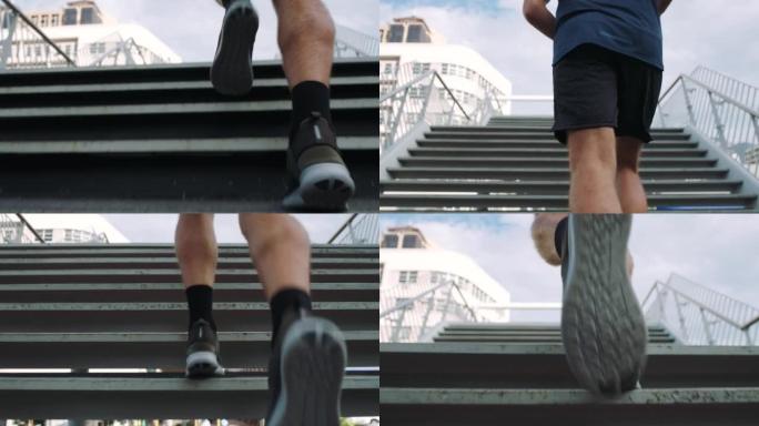 适合运动员在城市锻炼中跑步，以进行有氧运动或高强度运动。活跃，运动和运动的人在城市楼梯上训练强壮的肌