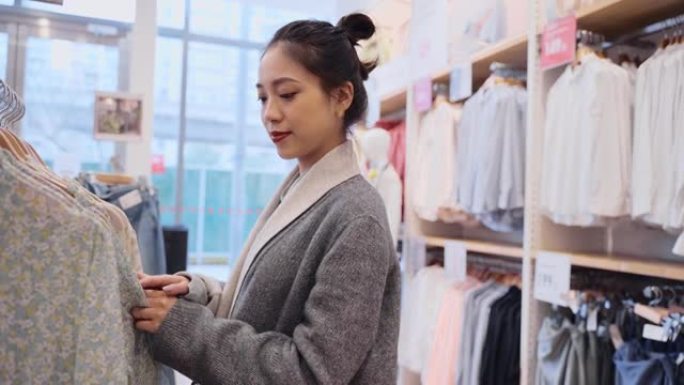 亚洲女性购物布商场店铺商城消费买衣服