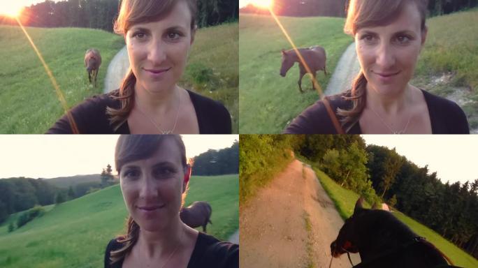 自拍照: 夏日傍晚的阳光照耀着女人骑马散步。
