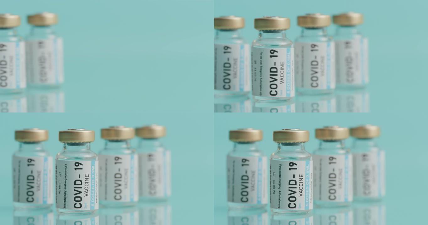 白天空诊所桌子上新型冠状病毒肺炎疫苗小瓶的4k录像
