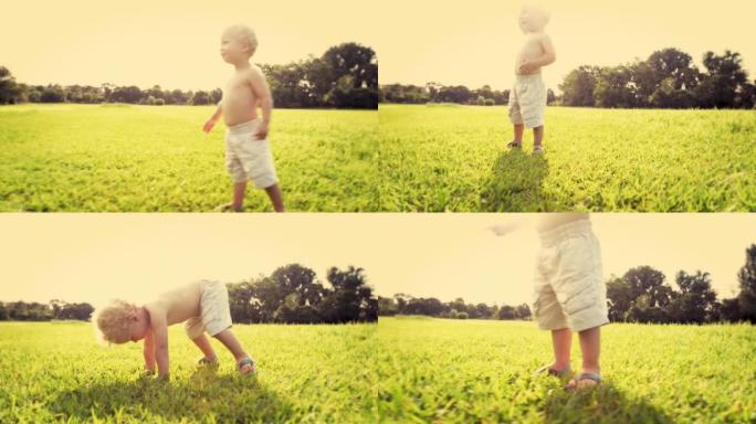 一个小男孩在公园里玩耍的4k视频片段