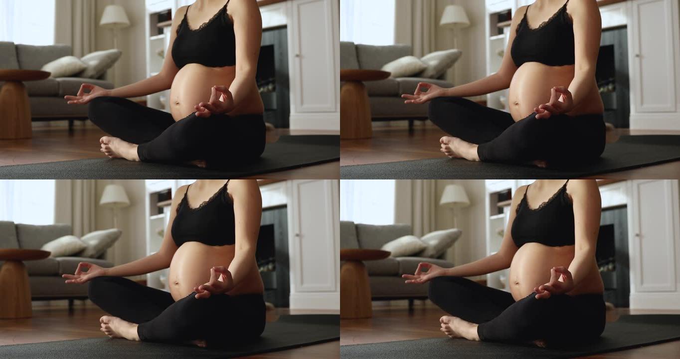 孕妇盘腿坐练瑜伽做呼吸运动