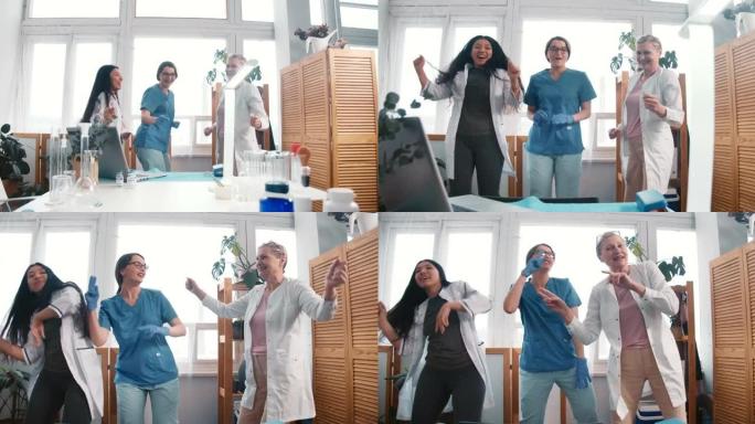 庆祝战胜大流行。三个有趣的兴奋年轻和资深快乐的女医生在诊所实验室一起跳舞。