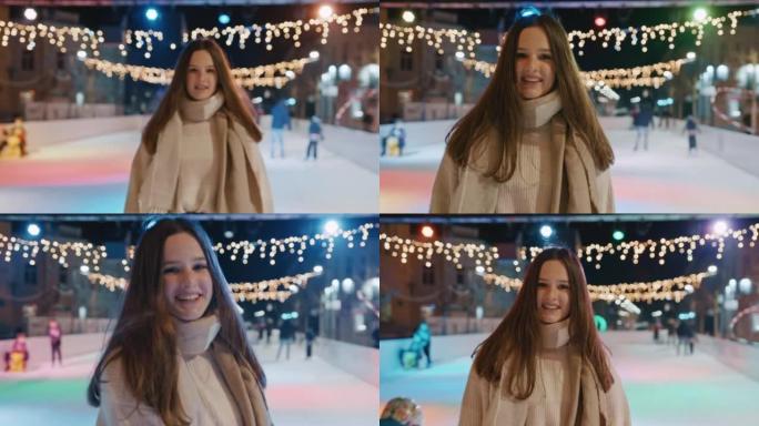 美丽的年轻女子在溜冰场上滑冰的肖像