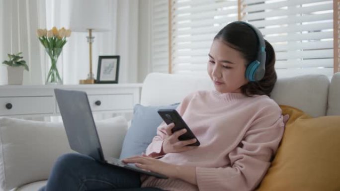 亚洲女大学生学习在家放松远程在线学习。