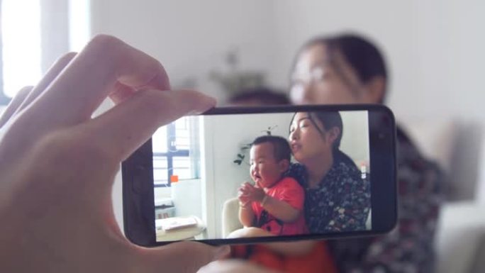 用手机拍摄家庭生活