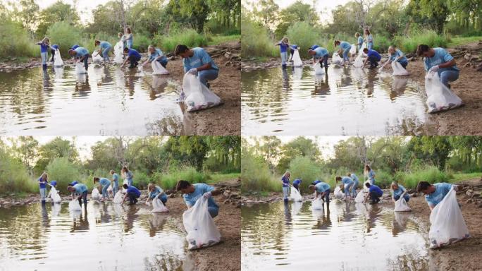 中年人在河道清理日志愿服务