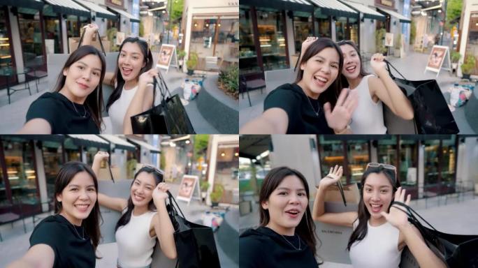 美女和朋友一起购物的肖像。